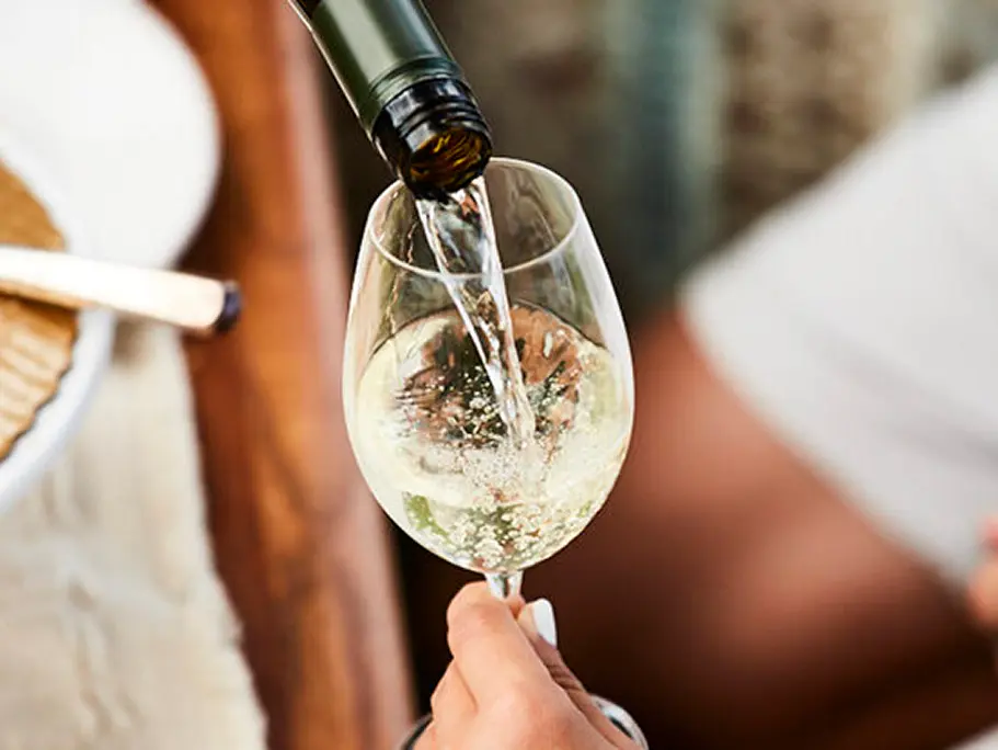 White wine being poured into glass